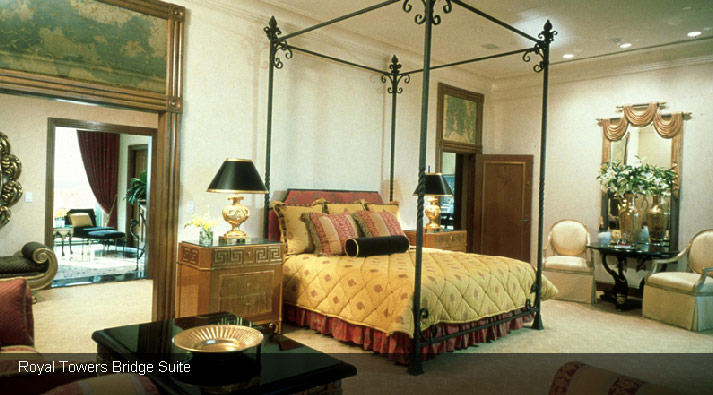 The dining room is highlighted by an iron and 22-karat gold chandelier, 