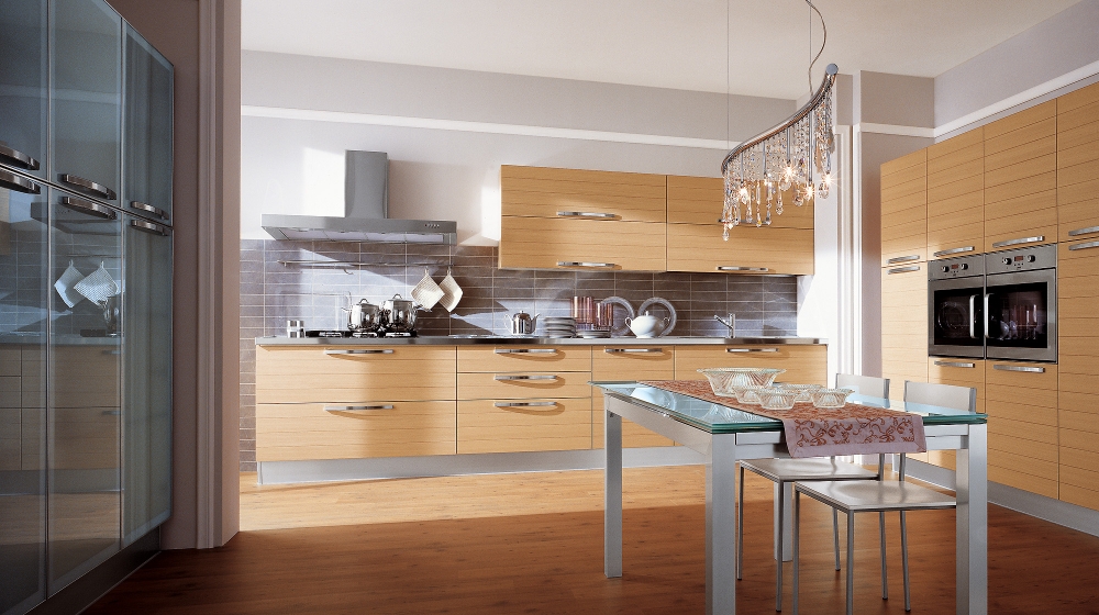 Modern-kitchen-design-with-wooden-cupboards-stoves-absorber-island-and-table-in-one-chairs-and-wooden-floor
