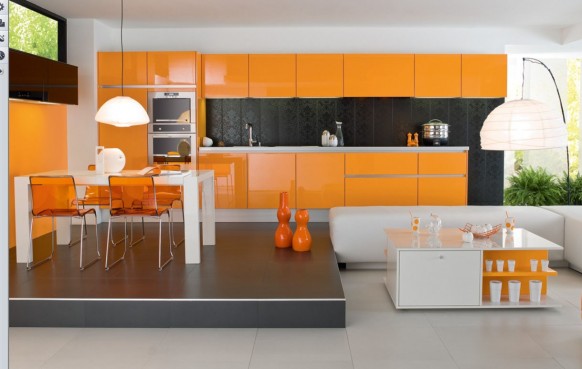 http://www.home-designing.com/wp-content/uploads/2009/06/orange-kitchen-582x369.jpg