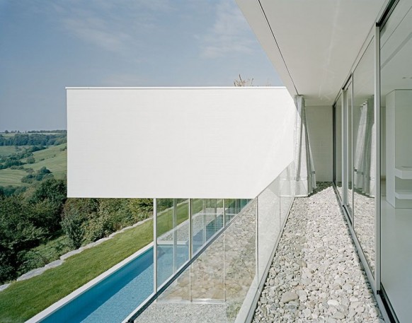 German architecture natural rock patio 582x457 Paradise in Germany: A Modern Minimalist Dream House