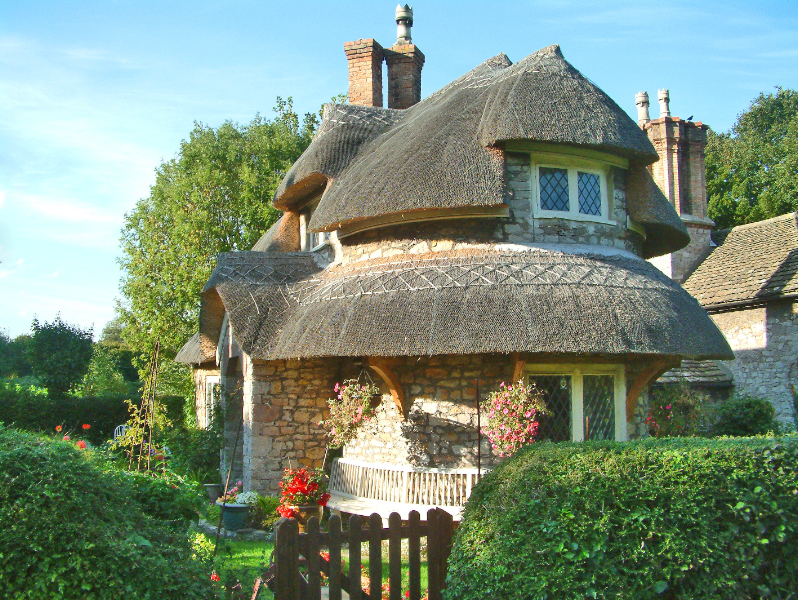Cottage-Homes-rounded-thatched-roof.jpg