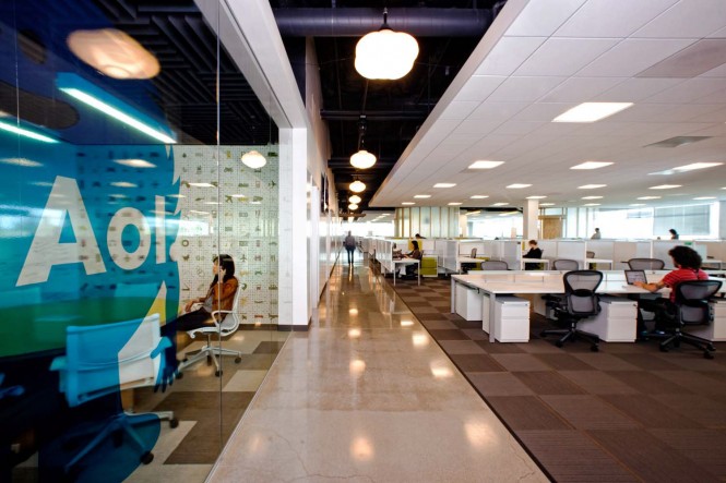 The traditional drop ceilings and cubicles were still incorporated as part of the design.