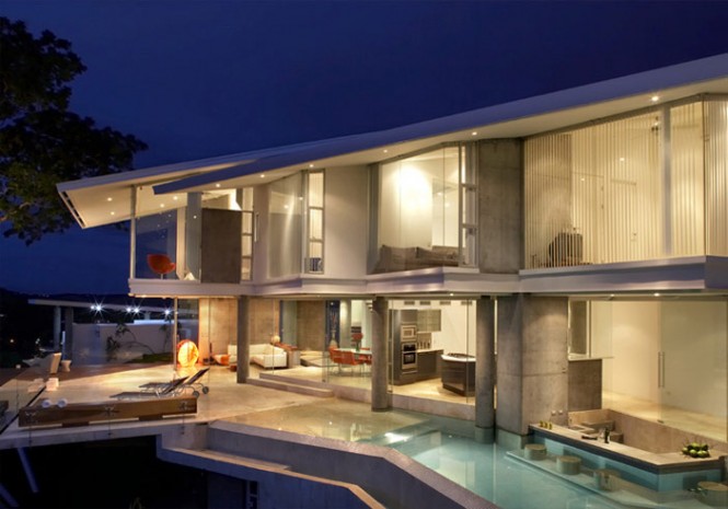 The entire house is covered in glass, instead of solid walls--to take total advantage of the majestic view.