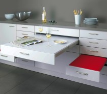 This pull-out dining design, by Alno, may look like a lightweight worktop extender, but features sturdy seats that can cope with loads up to 100 kilograms and a very generously sized table top that simply slides away after dinner.