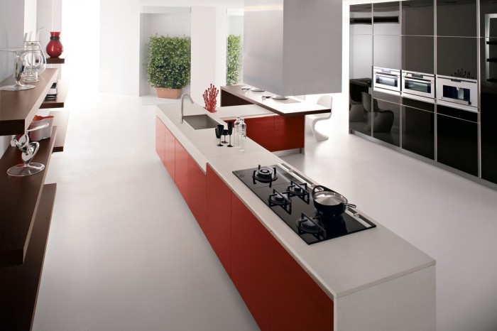 Red kitchen units white corian worktop