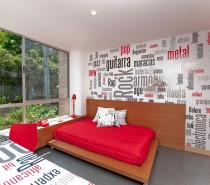 In the bedroom the typographical approach continues with statement feature wall and desk coverings.