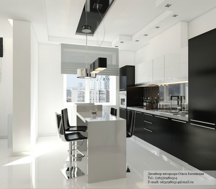 A careful mixture of black and white units keeps the cabinetry in this kitchen from becoming too dominant.