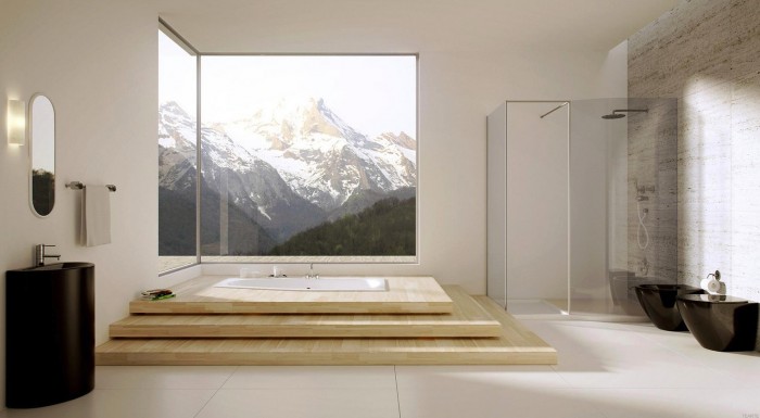 A mountain retreat boasts an awe-inspiring visage about a raised soaking tub. The bathrooms white, black and natural wood elements provide a stunning interior view.