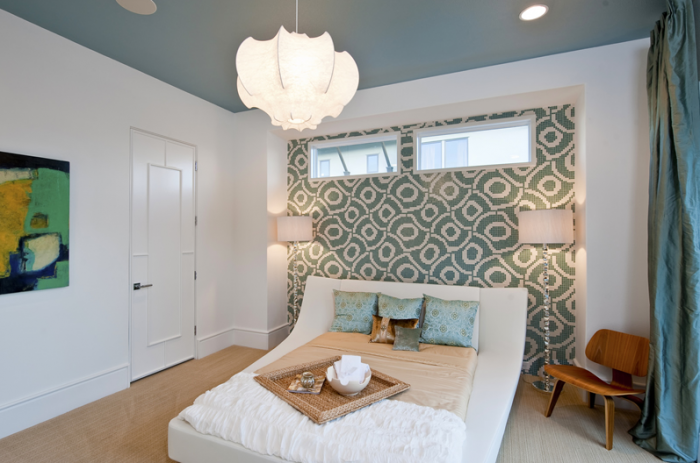 The basement is a perfect spot to tuck away a bedroom for extra privacy for guests and homeowners alike.