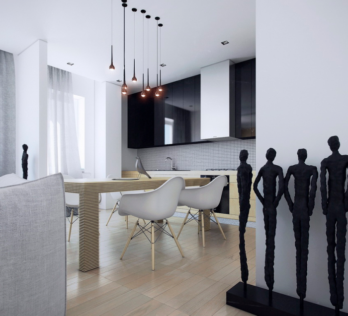 Even with a full size dining table for six in the middle of this kitchen there is still plenty of room to move freely while preparing meals.