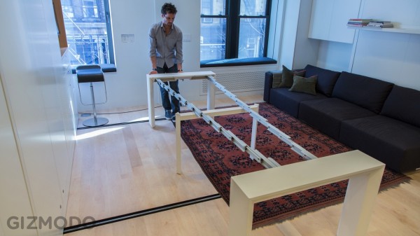 Hill sets up an expandable table for 10, turning the space into yet another room.