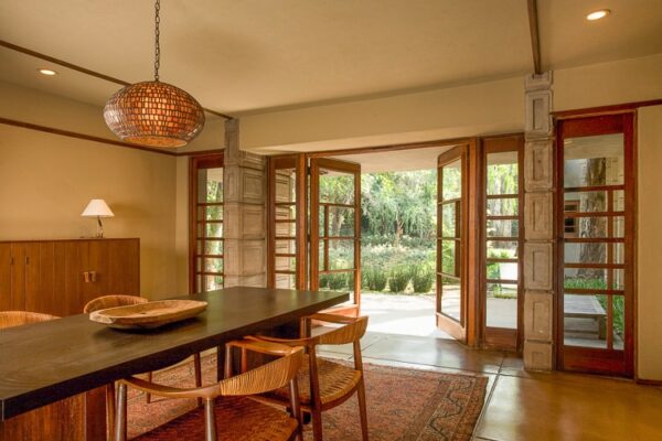 Frank Lloyd Wright Millard House open plan dining living terrace