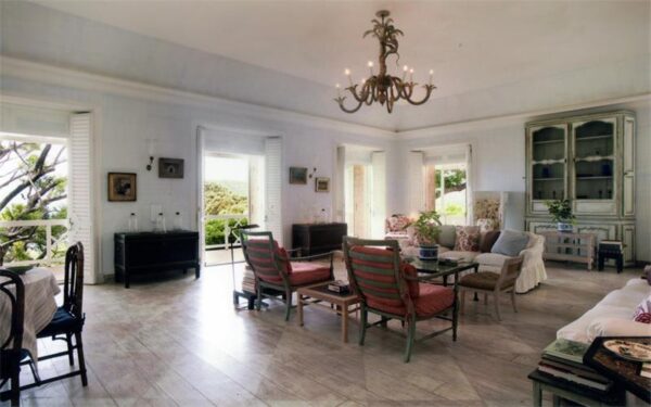 chandelier lit living wood floors antique style