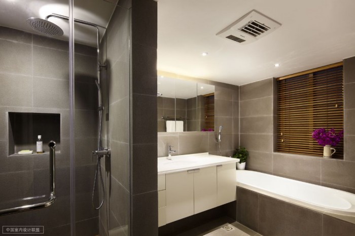 elemental slate tiles sleek tub down-lit bathroom