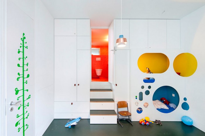 fitted storage boys room in white with bright accents