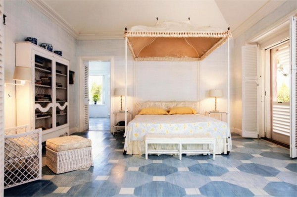 four poster bed geometric floors yellow accents