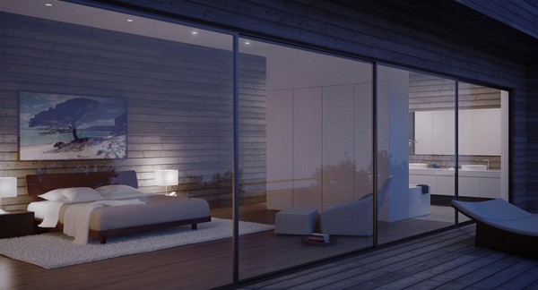 glass walled modern bedroom at night