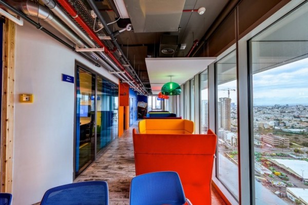 Google wouldn't be Google without its brilliant and vibrant trademark primary colors. This collaboration area boasts comfy wingbacks and other seating areas.