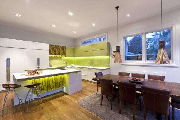 A touch of green, wood and faux bamboo gives this modern kitchen an organic feel.