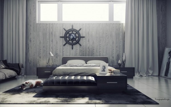 A modern bed unit with multiple storage options and a leather topped ottoman contrast nicely with the weathered elements of grey paneled walls.