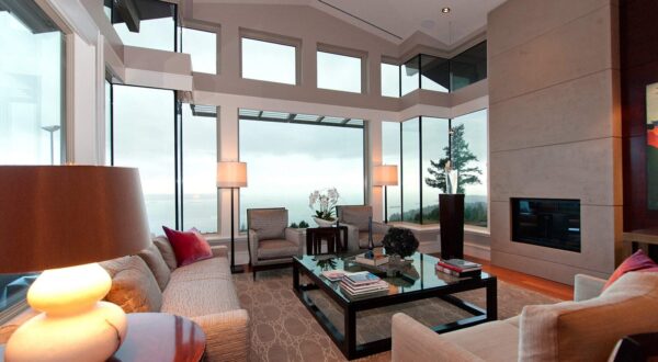 Large open spaces like this living room fill the 4400 sq ft penthouse. Furnishings are a mix of contemporary and modern furnishings.