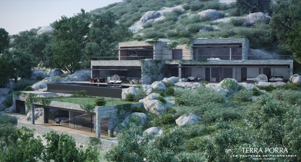 modern villas set into a rocky landscape