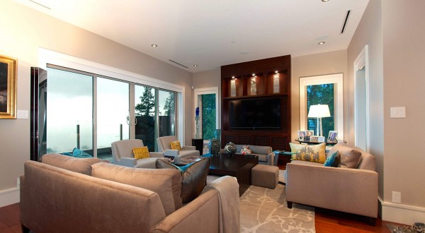 A second occasional living space has lowered ceiling for a more intimate feel.