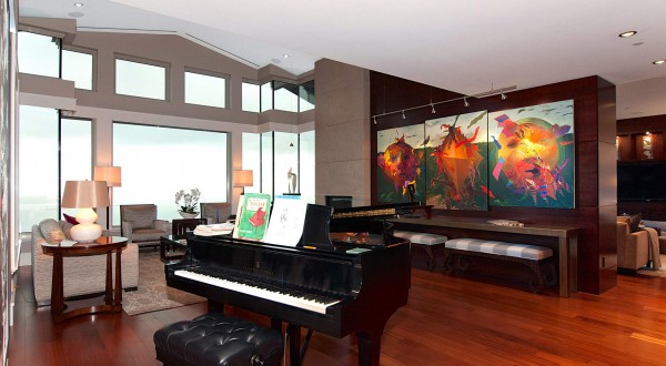 Modern art, such as the brilliantly-hued painting in the main living area, fill the penthouse.
