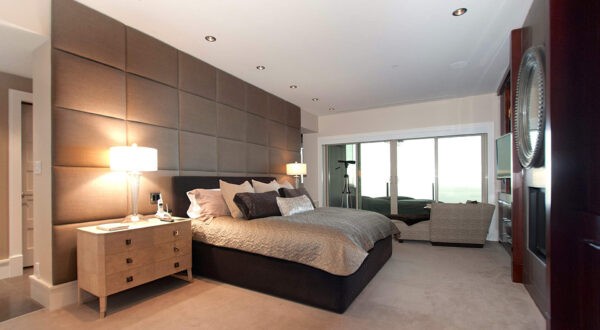 The master bedroom with luxury bathroom is open and light filled.