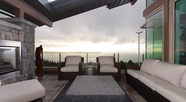 One of many terraces that open from main interior rooms, this lounge space looks out over the water.