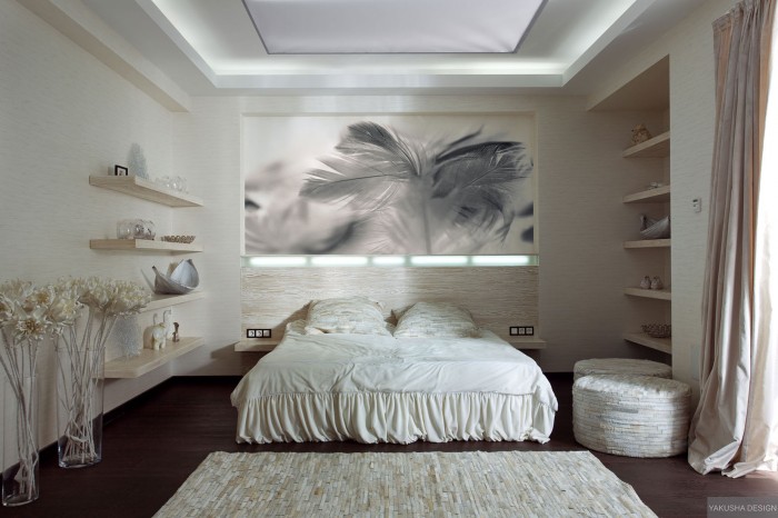 textured white bedroom with collectables displayed on shelving with feather print and textured rug