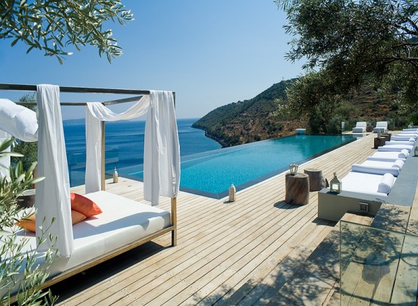 The main living area accesses an infinity pool and large lounge area with sea views.
