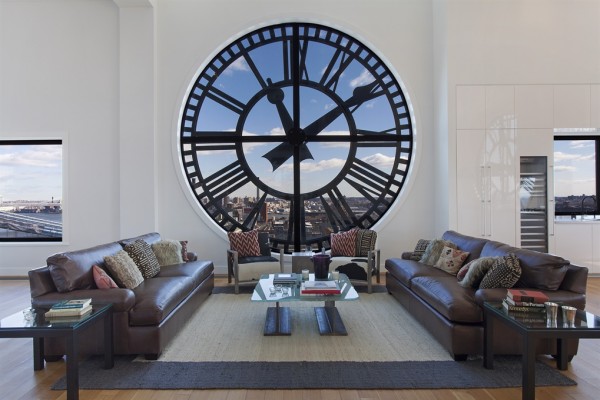 Clock Tower Apartment- White open plan living with clock face window leather and textural rug