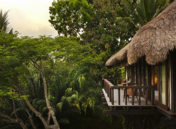 Como Shambhala Estate Bali- Guest room balcony thatched roof with views of forest