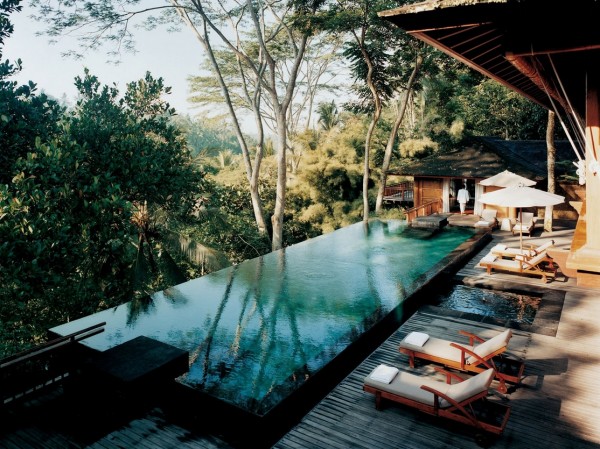 Como Shambhala Estate Bali- deckchairs and infinity pool with views