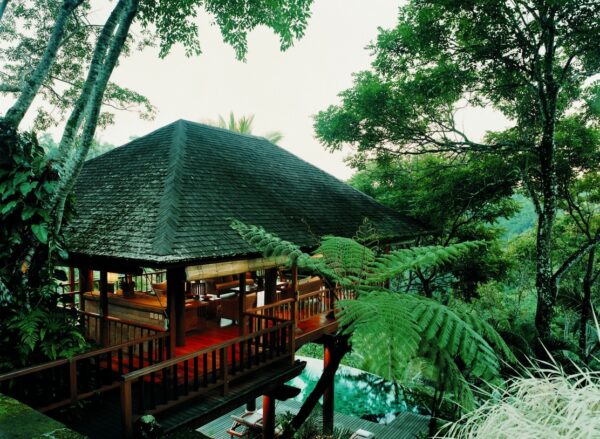 Wherever possible, the estate remains an example of traditional Indonesian architecture with its predominantly hardwood construction, breeze-capturing elevation, thatched roofing and open plan pavilion style interiors- often ornately carved in the famed Balinese fashion. As is also the Indonesian way, the estate is not one large construction but a series of buildings linked by tree-lined walkways and meandering stone steps, which in turn, grow out of and descend into the lush tropical landscape.