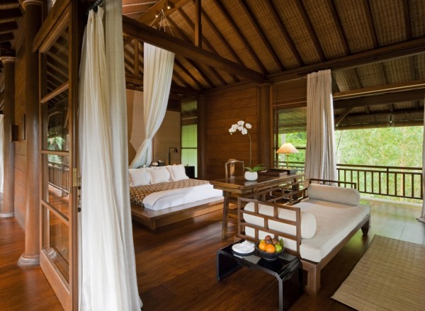 Como Shambhala Estate Bali- wooden and white pavilion style guest room with balcony