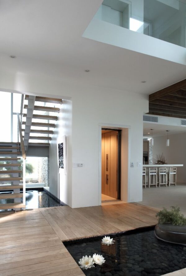 internal water feature pond with floating lotus lillies