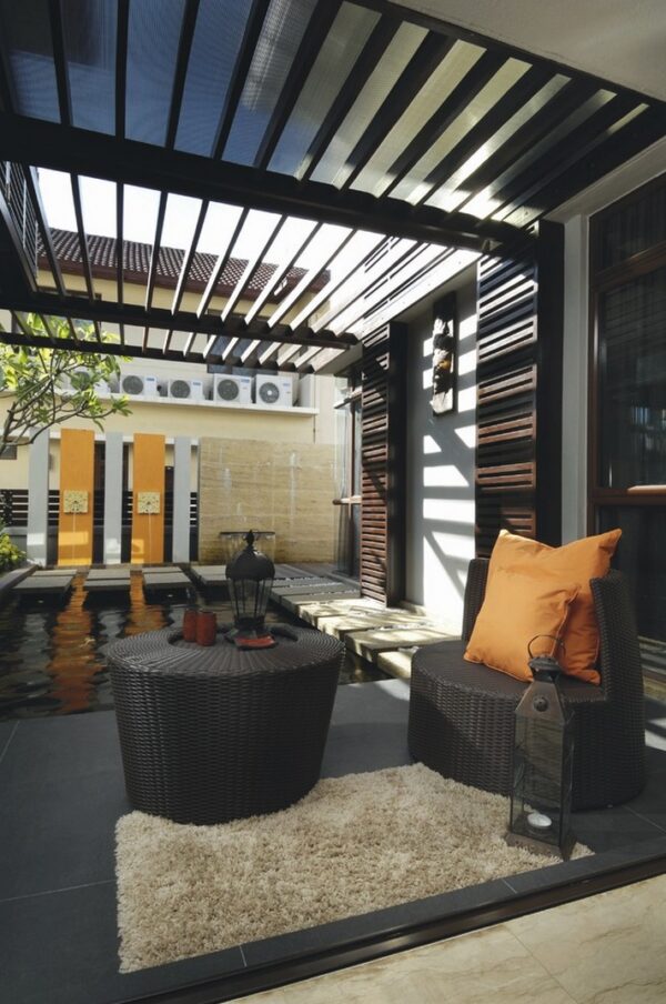 openair central patio water feature pond surrounded by rich elements