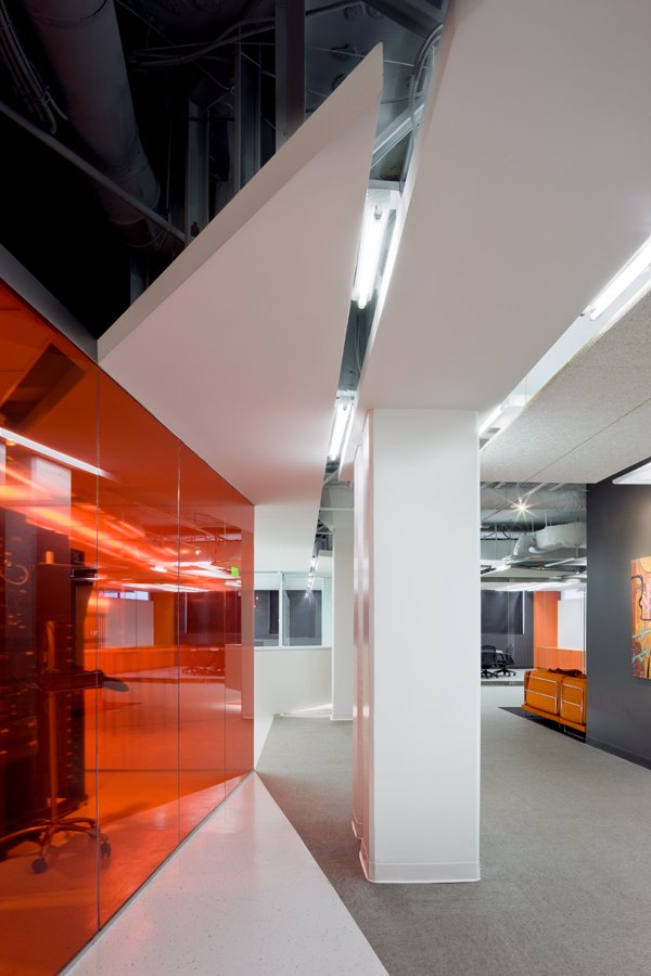 Kayak Startup Tech Office- florescent lit orange and white interior