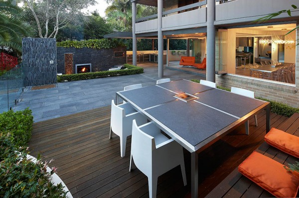 Outdoor Living with Sunken Lounge- in built dining table with wooden bench