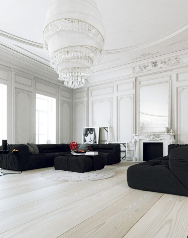 Parisian Apartment- living with large white chandelier and black lounges