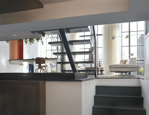 Pulltab Design- mezzanine office lounge with floor to ceiling windows
