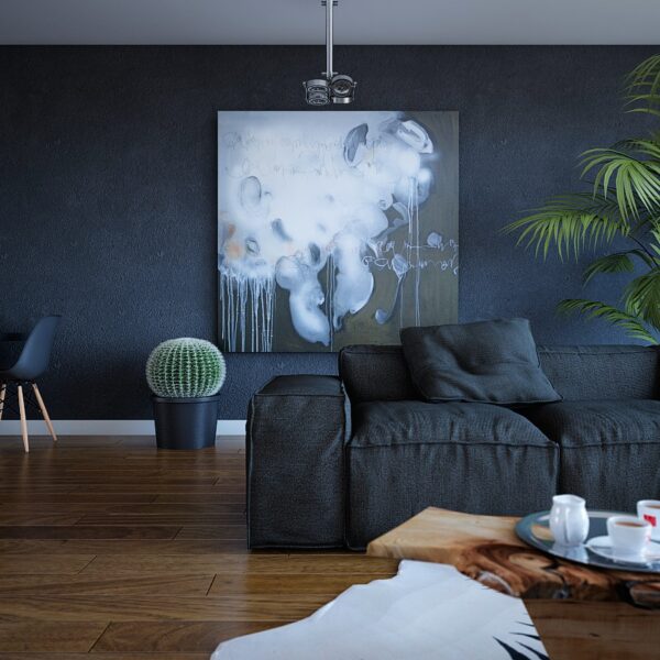 Textured Navy and Wood Apartment- dark couch with cactus and palm indoor plants