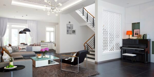 Tuananh Eke's white open plan living room with ornately carved laser cut feature wall