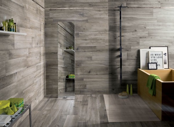 dark Grey wooden floor and wall tiled room with green accents