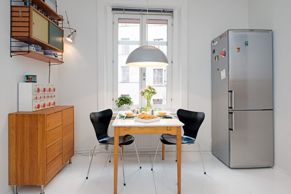 i Urban Apartment with Terrrace- casual kitchen dining setup with stainless steel fridge and storage