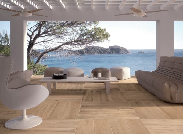 light outdoor space in white with wooden floor tiles and views