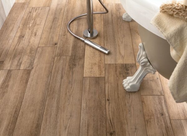 medium rough wooden floor tiles in bathroom closeup