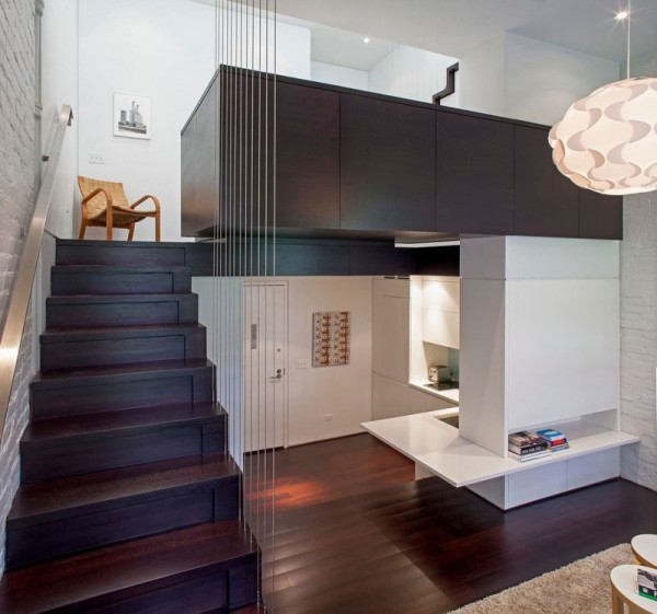 Manhattan-Micro-Loft- corner kitchen dark wood staircase